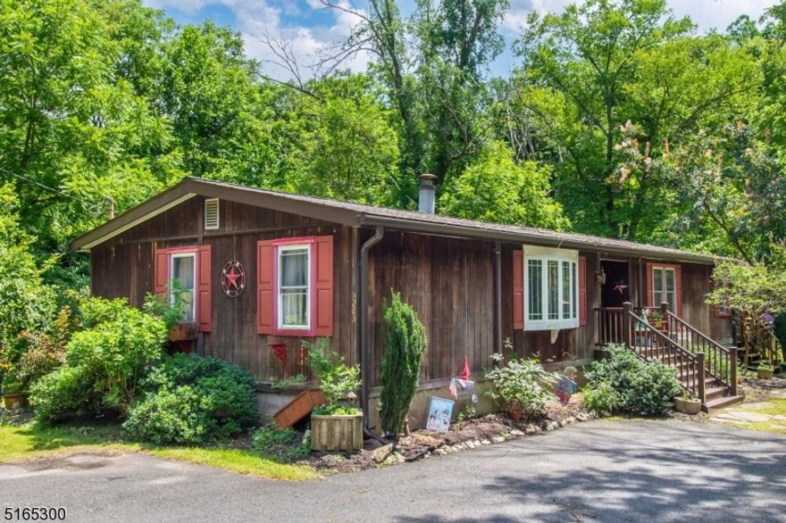 A Fisherman's Paradise! This 3 Bedroom, 2 Bath ranch sits right on the Musconetcong River. This peaceful property boasts back yard perfect for a Fisherman. New Composite Front Porch; Newer Roof; Split Ductless AC Units; two sheds and much more!