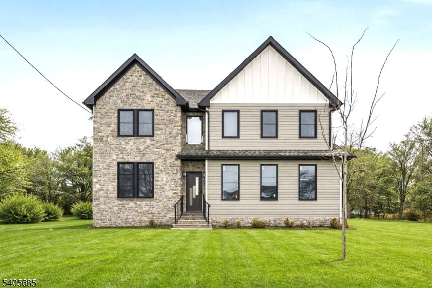 WOW! - BRAND NEW Construction with elegant modern front elevation with Triple pane glass European style windows. Home features 4 Bedrooms, 2.5 Baths, Full Basement, 2 car garage. Inviting foyer next to Living Room& Dining Room, Family Rm with Fireplace, open to big gourmet Kitchen, large Island, breakfast rm., and door to private backyard. the Kitchen boasts lots of cabinet space, quartz countertops, GE stainless steel appliances, tiled backsplash and H. Wood floor, recessed lights throughout the house, modern light fixtures, and tasteful colors on the walls. The second floor offers a luxurious Primary Suite with walk-in closets. The spa-like Primary Bathroom features double sinks, a freestanding tub, a separate toilet room, plus an oversized shower with rainfall showerheads and frameless glass. Additionally, there are three spacious bedrooms with walk-in closets, a full bathroom, and a laundry room for convenience. Plenty of storage throughout, plus a balcony overlooking the front foyer, adding a touch of character to the entry.Full 9' basement. Builder's 10-year home warranty. Paved asphalt driveway 14' wide along the property line. Make this your new dream home today!