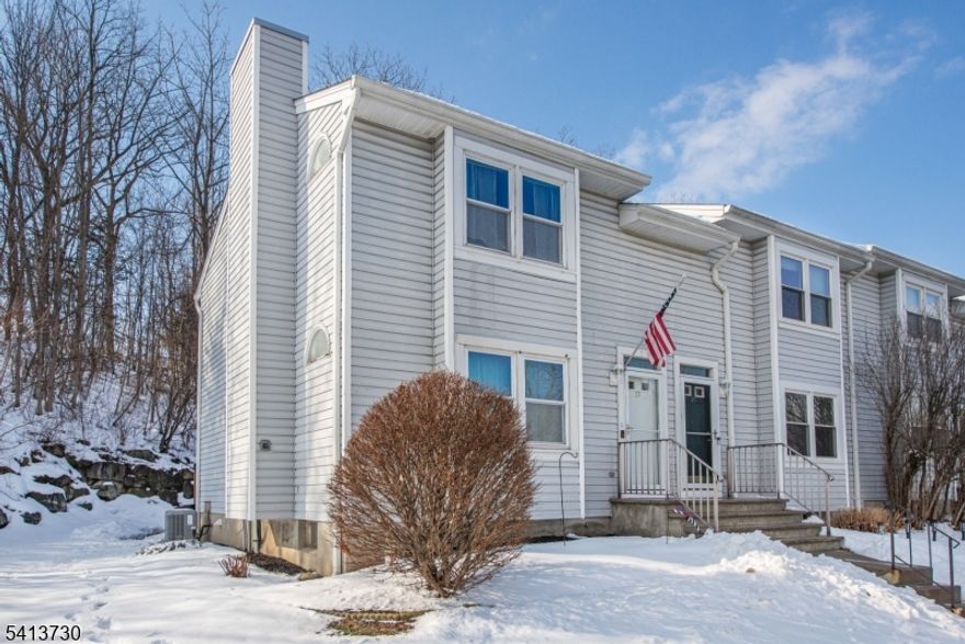 Impeccable end unit in a prime location with easy access to Route 23 and Route 94, plus a convenient pathway to the elementary school. A must-see home!This bright and spacious residence features a large living room with a fireplace and oak mantle, a formal dining room, and an eat-in kitchen complete with a breakfast bar.The primary bedroom offers a cathedral ceiling and double closets, while the second bedroom is generously sized. The main bath includes a cedar skylight tunnel, bringing in beautiful natural light. A finished room in the basement provides flexible space for a home office, gym, or recreation area, along with a huge storage/utility room.Beautifully decorated and truly move-in ready, this home combines comfort, style, and an unbeatable location.