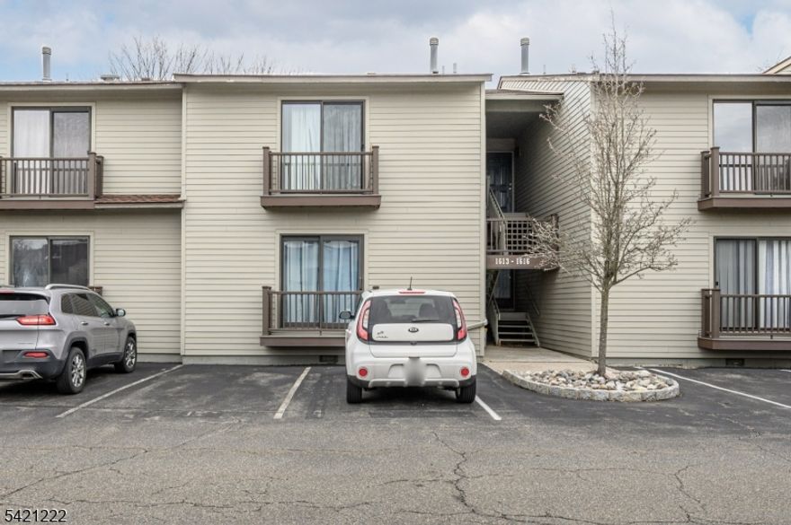 Spruce Hills premieres this lovely 2 Bed 1.5 Bath second floor unit with Master Suite, ready and waiting for you! Well maintained in a sought after community with plenty of amenities to indulge,  just pack your bags and move right in. Step in to find a spacious, light and bright living room and dining room with laminate floors that shine and tons of natural light all through. The living room is adorned with a soaring skylight, cozy wood burning fireplace, and tinted slider to your own private deck, perfect for enjoying your morning coffee. Down the hall, find the convenient 1/2 bath, along with 2 generous bedrooms with plush carpets and ample closets, inc the Master Suite. MBR boasts its own walk-in closet, balcony and access to the main full bath. In-unit laundry adds to the convenience of this charming home. Central air/forced heat, ample on-site parking, and amenities to enjoy such as the outdoor pool, dog run, and multi-use sports courts. All in a convenient commuter location near shopping, dining, major roads and more. This is the perfect starter home. Don't miss out! Come and see TODAY!!