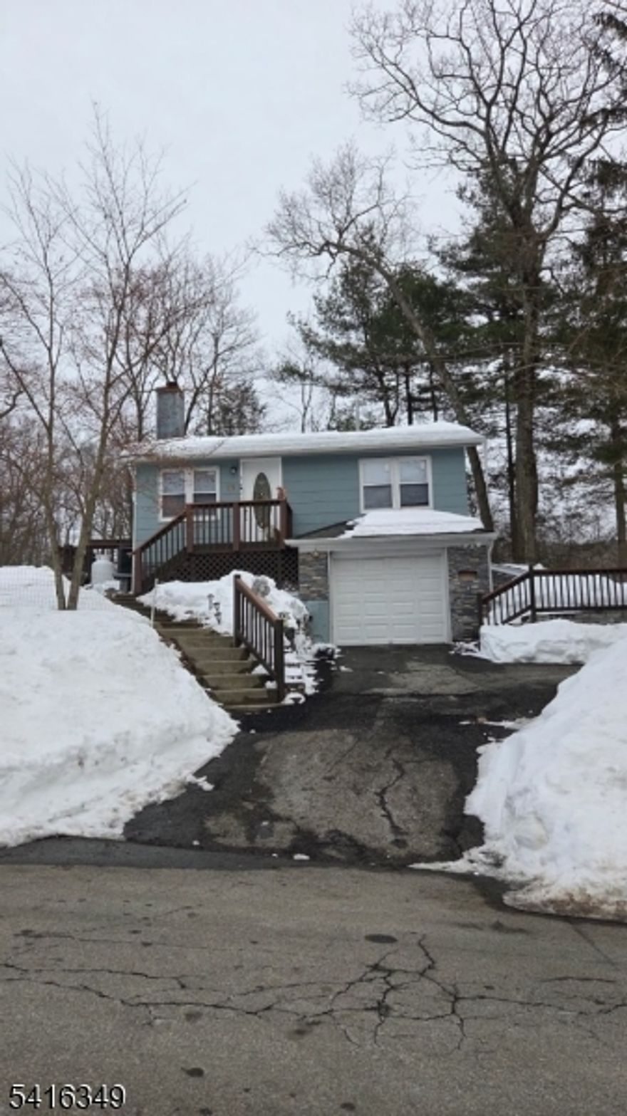 Enjoy this perfectly nestled property blocks away from Upper Greenwood Lake.  Brand new septic installed 2025.  New appliances. Excellent basement space for cars/toys/storage/extra room.