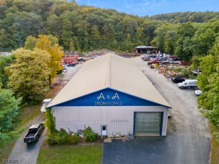 This is an excellent opportunity! 3.5 acres!!! The 11,500 sqft warehouse features 30ft ceilings at a high and 20ft ceilings at a low. 3 roll-up doors for 18- wheelers access, 3 offices with 1.5 baths. property is ideal for various business ventures. This property is zoned for industrial very rare!   The current business A&A Ironworks, has a solid 41 year history and is available for separate purchase.