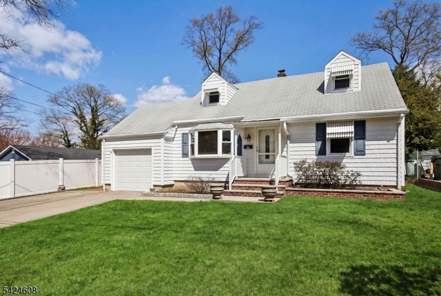 Welcome to this expanded 4-bedroom, 2 bath Expanded Cape Cod offering exceptional space, flexibility, and value in a convenient Colonia location. This well-maintained home features a large family room addition with vaulted ceilings and new flooring, tons of light and an open concept kitchen family room  - bright, open space ideal for everyday living and entertaining. sp.  The formal living room creates a most inviting atmosphere perfect for entertaining.  Four freshly painted spacious bedrooms and two full baths lend to the versatility.  While move-in ready, the home offers the opportunity to further update to your own style. Ideally located close to all levels of schools (approximately within one mile), with easy access to St. Georges Avenue, the Garden State Parkway, and nearby public transportation via Metropark Station for a direct NYC commute. Shopping, dining, and everyday conveniences are just minutes away.