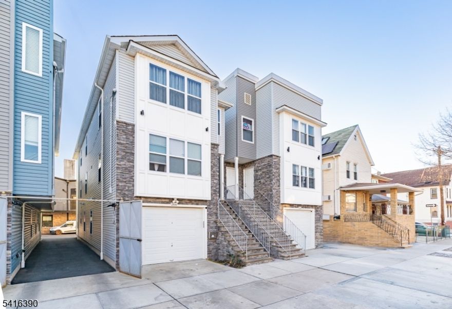 NEWLY BUILT, UNIQUE two-family featuring a rare ground-level unit with 2 rooms and a full bath, home office, or added flexibility. The definition of turnkey, located in North Newark, bordering Bloomfield and Belleville. Built by an experienced builder with no expense spared, showcasing quality craftsmanship, modern finishes, and thoughtful design throughout. ideal for Owner-occupants or investors seeking low maintenance, strong rental appeal, and long-term value in a high-demand location close to major transportation, shopping, and dining. come turn this house into a home before someone else does!