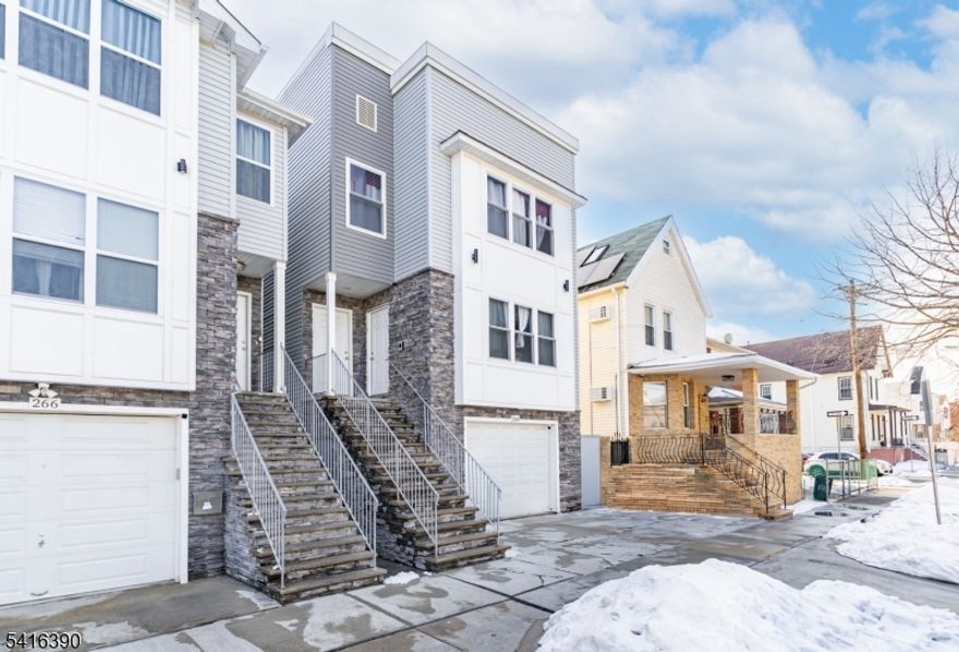 NEWLY BUILT, UNIQUE two-family featuring a rare ground-level unit with 2 rooms and a full bath, home office, or added flexibility. The definition of turnkey, located in North Newark, bordering Bloomfield and Belleville. Built by an experienced builder with no expense spared, showcasing quality craftsmanship, modern finishes, and thoughtful design throughout. ideal for Owner-occupants or investors seeking low maintenance, strong rental appeal, and long-term value in a high-demand location close to major transportation, shopping, and dining. come turn this house into a home before someone else does!