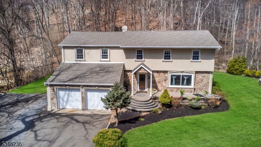 Located in the heart of Kinnelon, offering 4 spacious Bedrooms, a BONUS OFFICE space, and 2.5 bathrooms, it features a variety of living areas, including a bright living room, elegant formal dining room, and a family room, all adorned with gleaming hardwood floors. Modern finishes and amenities throughout make this home both stylish and functional. Oversized deck and enjoy a vast, beautifully landscaped yard ideal for outdoor entertaining or simply relaxing.This home has been meticulously maintained with updates that include newer windows, a 5-year-old roof, upgraded furnace, 2 newer AC/Heat units, and a 12 zone sprinkler system. Located within walking distance to Kinnelon High School, Kiel Elementary School, and the Kinnelon Public Library this home offers unbeatable convenience. Plus, you're just a short distance from a private lake, Silas Condict County Park, shopping centers, and more. Don't miss the chance to make this beautiful property yours! Schedule your showing today and experience the charm of Kinnelon living.