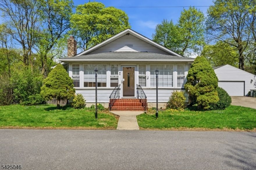 Inviting ranch-style home set on a rare oversized lot, offering space, flexibility, and endless potential! This 3-bedroom home features easy one-level living with a comfortable layout perfect for everyday life. Enjoy morning coffee or unwind in the bright enclosed porch, overlooking a fenced yard ideal for pets, play, or entertaining. Step outside to a spacious patio, perfect for summer gatherings and relaxing evenings. Car enthusiasts, hobbyists, or anyone needing extra storage will love the oversized detached garage, providing plenty of room for vehicles, equipment, or a workshop. With its generous lot size, outdoor living spaces, and versatile features, this home is a fantastic opportunity to make your own!
