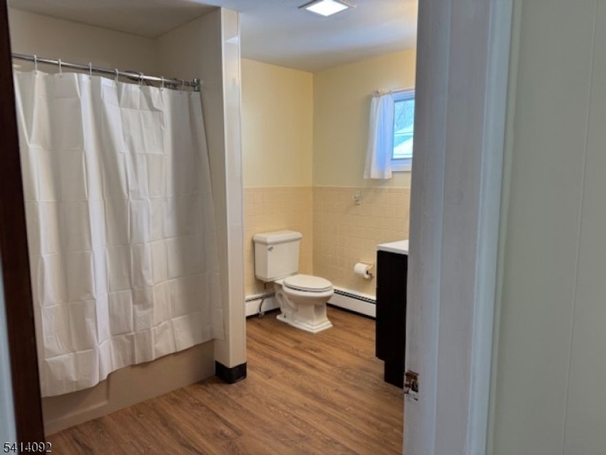 This freshly updated SINGLE FAMILY home on a large corner lot is waiting for you!  Relax on the Wrap-around FRONT PORCH and at dusk, see Beautiful Views of the Sunset from the BACK DECK.  As you enter this Bright and Sunny Home you will notice the care that was taken. The NEW KITCHEN is COMPLETELY REDONE and fully appointed with BRAND NEW 4-piece SS Appliances, BUTCHER BLOCK Counter Tops and NEW CABINETS! The LAUNDRY Room is located on the main level right off the mud room area.  Freshly painted throughout the house. The Living Room is large enough for any BIG SOFA you may have! The Second floor of this great home has BRAND NEW CARPET, 3 BEDROOMS and an abundance of closets. The Updated Full Bath is HUGE.  The Landlord has provided TWO Outdoor Sheds for tenants use. Off-street parking enough for 4 cars in the driveways. This Rental has EVERYTHING you will need to live very comfortably. Hurry, this one won't last!