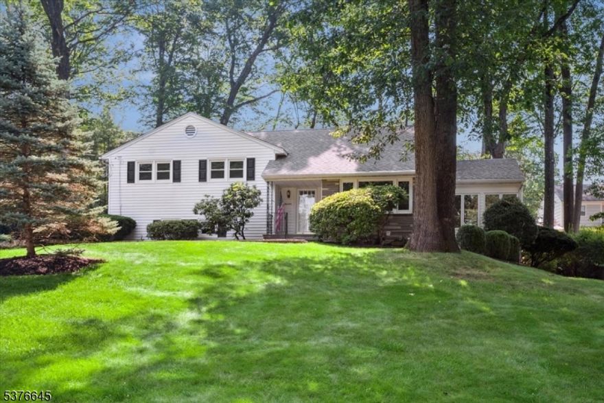 LUXURY RENTAL in Prime Morris Township! Tucked away on a quiet cul-de-sac, this FULLY RENOVATED 4-bed, 2.5-bath split-level home blends modern style with everyday comfort just minutes from vibrant Morristownr. Step inside to beautifully refinished hardwood floors, recessed lighting, and a flexible layout ideal for today's lifestyle. The gourmet kitchen features white quartz countertops, a large center island, white shaker cabinets, porcelain tile backsplash, gas stove, built-in microwave, matte black faucet over a deep stainless steel sink, and a cozy breakfast nookJust off the kitchen, enjoy a peaceful sunroom and access to a freshly painted deck overlooking a spacious backyard. A few steps down, the inviting family room includes a convenient powder room and access to the 2-car garage. Upstairs, you'll find three bedrooms including a primary suite with an en suite bath plus a full hall bath, both with glass door showers and porcelain tile. A few steps higher, a large fourth bedroom offers double WIC. The full basement includes laundry with washer/dryer, a workshop area, and generous storage space. This home is equipped with a Whole House Generator, ensuring comfort and peace of mind year-round. Enjoy close proximity to Midtown Direct Train to NYC, major highways (287, 24 & 78), Morristown Medical Center, Mayo Performing Arts Center, top schools, Ginty Pool, and local parks. Just 20 minutes to Newark Airport this is location, luxury, and lifestyle at its best!