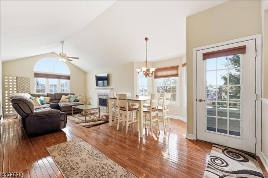 Located in the desirable Bridle Club community, this well-maintained second floor 2-bedroom, 2-bath end unit is positioned at the front of the complex, offering easy access, added privacy, and a quiet, tucked-away feel.With southern exposure, the home is filled with natural light throughout the day. The open layout features cathedral ceilings, hardwood flooring, and a wood-burning fireplace that creates a warm, cozy focal point for the living and dining areas. Sliding doors lead to a private balcony, perfect for morning coffee, evening relaxation, and enjoying seasonal fireworks views. The kitchen is both functional and welcoming with stainless steel appliances, glass cabinet doors, ample cabinetry, and recessed lighting.Both bedrooms are generously sized and include ceiling fans, with the primary suite offering a full en-suite bath and large walk-in closet. Bedroom remotes allow convenient control of lighting and fans while relaxing in bed, adding everyday comfort.Additional highlights include plenty of parking located directly in front of the building, central air, in-unit laundry, and a pet-friendly community with no restrictions. Residents enjoy access to amenities including a pool, clubhouse, tennis courts, playground, and walking paths. Set in a quiet, low-traffic area with no speed humps, this home offers an airy, comfortable place to call home while remaining close to everyday conveniences.