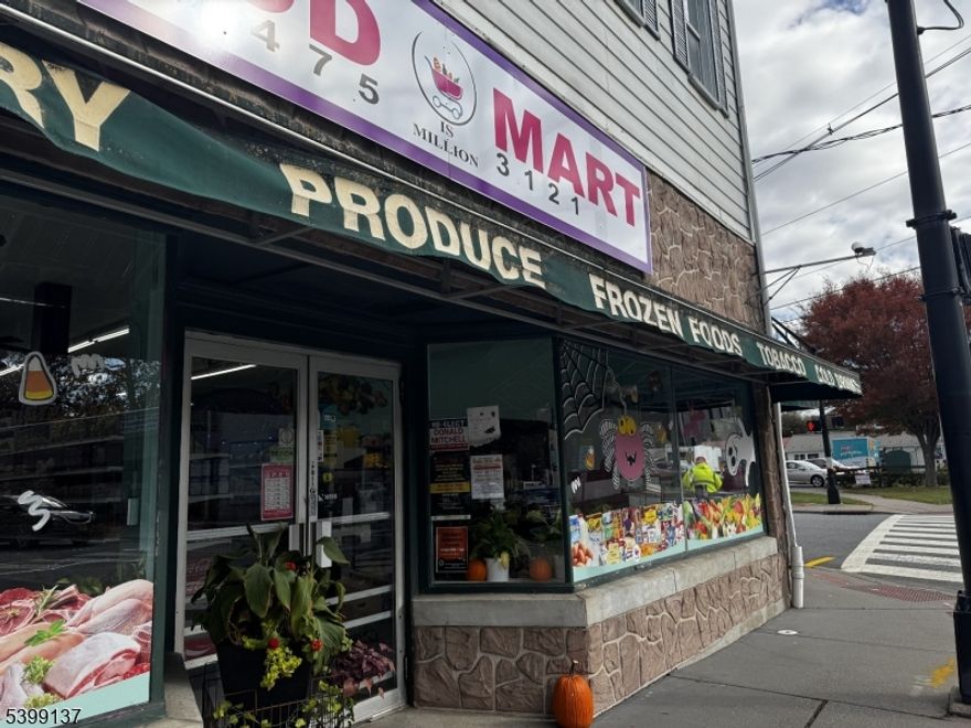 Positioned at the only stoplight in town, the iconic Foodmart building commands one of the most visible and high-traffic corners in Belvidere. Set prominently where the main thoroughfare meets the road leading directly to the toll-free bridge into Pennsylvania and offering quick access to Route 46, this property stands as a landmark presence with exceptional exposure and strategic convenience. This substantial mixed-use building spans three levels, offering an exciting combination of existing income and untapped potential. The first floor is fully leased, providing immediate, consistent monthly revenue from a long-established commercial tenant. Above, the second and third floors offer expansive square footage that has remained unused for decades an extraordinary canvas ready for transformation. With thoughtful renovation once approved by the zoning department, these upper levels could be reimagined into residential units, professional offices, creative studio spaces, or other high-demand uses suited to this prime location. A rare opportunity for investors, developers, or owner-users, this property blends historic character, unbeatable visibility, and significant value-add potential. Whether revitalized for modern mixed-use living, boutique commercial spaces, or a combination of both, the Foodmart Building is poised to become a centerpiece of Belvidere's continued growth.  Schedule your tour of this incredible building today!