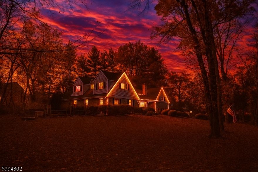 This winter, imagine cozying up beside one of your THREE wood-burning fireplaces.  Then, when the night winds down, retreat to your FIRST-FLOOR PRIMARY suite, a private sanctuary. The spa-inspired bath offers every luxury steam shower, soaking tub, dual vanity, and private water closet.  This home radiates humble charm & elevated comfort, with a hilltop-retreat feel rarely found in Basking Ridge. Beautifully expanded & well maintained, this residence sits on 1.24 east-facing acres.  At the heart of the home, the huge open-concept kitchen & dining area, complete with its own fireplace, invites gathering, conversation, & connection. Just steps away, the sun-filled two-story family room delivers remarkable scale & warmth, featuring another striking fireplace & French doors that open effortlessly to the deck and patio. The main level continues w/ two additional bedrooms and two full baths, along with a formal sitting room anchored by the home's third fireplace.  Upstairs, two charming bedrooms share a well-appointed Jack-and-Jill bath.  For even more space, head above the oversized two-car garage to find a versatile 6th bed/bonus suite.  Thoughtful upgrades throughout enhance comfort, efficiency, and peace of mind, including: Brand-new driveway and freshly painted dual garage bays. Whole-house generator.  Heated gutters. Custom wine cellar. Expansive deck, patio, & hot tub. Seller financing up to $150,000 may be available for 24 months @ below market interest rate.  Tour today!