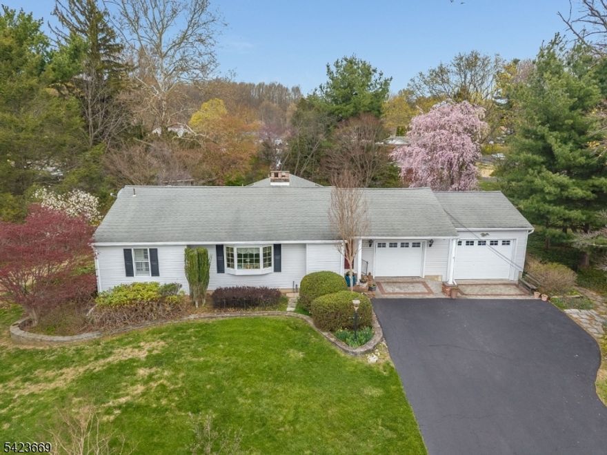 *Requesting all offers to be submitted by 4/21/26 @ 5:00. Welcome to this Sunny & Bright 3 BR, 2 BA Ranch set on a Picturesque .72-ac lot in a Peaceful Country Setting. Lovingly maintained, this home offers the ease of one-floor living & features HW floors throughout. Step into the inviting living room w/a wood-burning fireplace - perfect for cozy gatherings. Down the hall, you'll find 2 bedrooms & full bath. An expanded addition w/cathedral ceilings extends the primary suite, featuring an en suite, along w/a spacious family room providing generous & comfortable living space. The kitchen flows effortlessly into the dining & family room, highlighted by skylights & sliders that fill the space w/abundant natural light. Outside, enjoy a serene, park-like yard complete w/a Trex deck & patio ideal for entertaining or simply relaxing while enjoying the natural landscaping that provides privacy as well as spacious lawn areas for recreation. Mature gardens & thoughtfully maintained landscaping are beautifully arranged to showcase blooming plants throughout the seasons. This home offers close proximity to outdoor recreational activities, ideally located just minutes from the Delaware River & charming river towns, such as Milford & Frenchtown. You'll enjoy easy access to vineyards, farm-to-table dining, farmers markets, biking, hiking, river adventures, & more. Additional features include a 2 car garage, full basement, & Public Sewer.