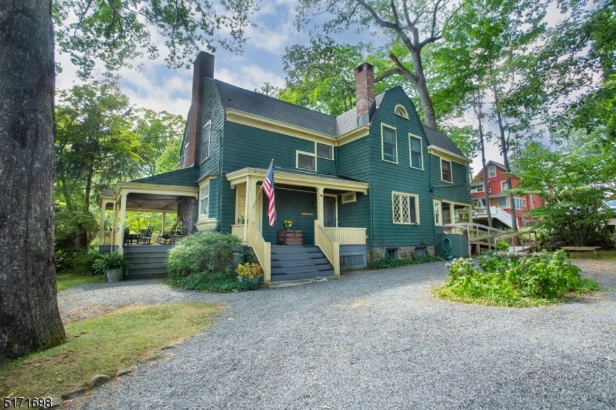 Built in 1898, for J.W. Cleveland Esq., this classic Victorian home is the crown jewel of Mt. Tabor, a quiet historic community in the hills of Parsippany.  Whether you need to store your classic car or lawn tools, bikes and sleds, Mt Tabor's first-built, detached garage has plenty of room for your needs.  With two driveways affording parking for up to 9 vehicles, there is plenty of room!Enjoy the endless cool summer breezes while you entertain on any one of the 3 lower porches or sit with a loved one on the balcony off of the primary bedroom.  This gem is centrally located atop Mt. Tabor and it's a chip shot away from a beautiful 9-hole private country club.  You'll also find it a short to walk to the basketball court, playgrounds, a fishing pond, and the tabernacle.  Walk to the local elementary school, or the Mt. Tabor train station. This 5 bedroom, 2.5 bath home sits on .049 acre. The first floor has an eat-in kitchen with a true butler's pantry. The pantry is adjacent to the dining room where you will find a decorative venetian ceiling and wide moldings. The living room centerpiece is its original fireplace with brick hearth and mantel, and the dutch door accessing one of the spacious open porches. Another architectural highlight of this home is the gambrel roof and turn of the century shingle style exterior.  Thirty-five Ridgewood Avenue awaits its fourth owners who will surely make lifelong memories in a home, (and town) truly like no other.
