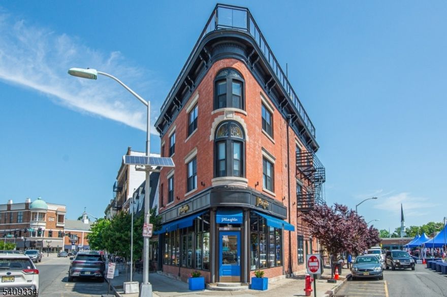 *Lease term negotiable for shorter or longer term* Luxury living in iconic Flat Iron building in the heart of the downtown Westfield. Completely restored and renovated 2 bedroom, 2 bathroom penthouse apartment with 1,000 sq ft rooftop deck. New electric, plumbing heating, cooling & designer finishes throughout. Wide Plank Oak floors, 9 ft high ceilings, restored exposed brick walls, and abundance of large windows for fantastic daylight and views. Kitchen with white cabinets, granite counters & stainless steel appliances. Built-in banquet with storage and shiplap accent wall make up charming and functional eating area. Primary suite features 2 closets and luxurious bath with oversized shower. Second bedroom offers 2 closets as well. Hallway bath is stylish and functional. Stackable Washer/Dryer in the unit. Many bonus features and only 1/2 block to train station.