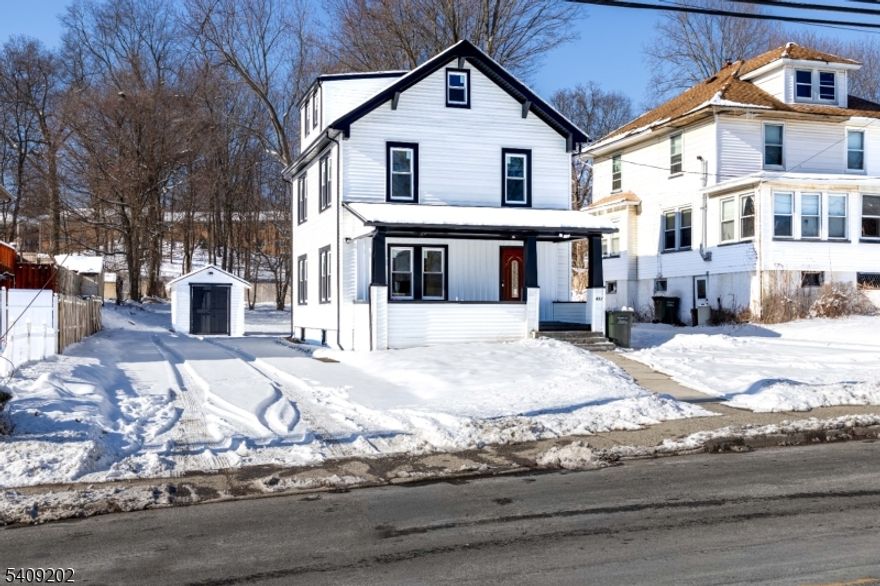Completely renovated and beautifully reimagined, this 3-bedroom, 1-bath home with additional finished attic and walkout basement offers over 2,000 sq ft of flexible living space. The property features a brand-new roof, all new Low-E energy-efficient windows, new electrical (200 AMP service), new plumbing, and a high-efficiency multi-zone natural gas combi heating system with independent thermostats on every level.The open-concept main level showcases soaring ceilings, refined crown molding and custom wainscoting, new flooring throughout, and recessed lighting. The brand-new kitchen features modern cabinetry, quartz countertops, farmhouse sink, Samsung Bespoke glass appliances, and gas range.The spa-style bathroom offers a double vanity, soaking tub, smart heated auto-flush toilet, premium tile, and smart ventilation fan with built-in speakers. The attic provides ideal flex space, while the walkout basement includes an electric fireplace, laminate flooring, recessed lighting, and washer/dryer hookups.Extensive exterior upgrades include new entry doors, all-new exterior finishes, upgraded hardscaping, and full oil-to-gas conversion. Offering exceptional commuter access and close proximity to major shopping and dining, this home delivers modern luxury with everyday convenience.