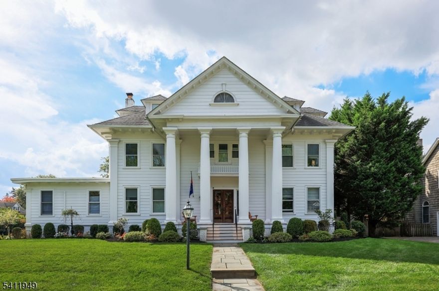 This extraordinary 6-bedroom, 3.1-bath Neo-Classical Colonial Revival is a true architectural treasure, distinguished by its storied past & timeless elegance. Having been owned by several of town's most prominent households, this iconic residence blends rich local history with enduring prestige & masterful design. Stately columns frame the grand front entry, setting the tone for the refined interiors within. A gracious foyer welcomes you into the formal living room w/fireplace and elegant dining room ideal for sophisticated entertaining. The family room features a gas fireplace & wet bar, offering the perfect setting for relaxed gatherings. The EIK is thoughtfully appointed w/center island breakfast bar, butler's pantry & dining area. Upstairs, the primary suite offers dual WICs and private bath. Three addl bedrooms & full hall bath complete the second level. The third floor provides exceptional flexibility with/bonus room, two addl bedrooms, and a full bath ideal for guests, offices or creative space. Outdoors, a covered back porch overlooks the fenced backyard, where an in-ground heated pool creates a private retreat for summer enjoyment. Once home to the Westfield Woman's Club, this remarkable property carries a distinguished legacy while offering the grandeur & craftsmanship of a bygone era. Defined by classic architectural detail, stately proportions, and refined finishes, this is a rare opportunity to own a home where history and sophistication exist in perfect harmony.