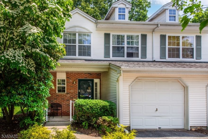 Welcome Home ! Beautiful and spacious Alpine end unit boasts plenty of natural light. Newly painted!  Features include a  spacious garage on main living level, laundry on first floor. Enjoy the warmer weather on the  rear patio off the living room w sliders, kitchen was updated 2017 w new cabinets, granite counters and breakfast bar, SS appliances.  2 Bedrooms on the second floor, Primary bedroom features jacuzzi tub and large walk in closet, Bonus room to make an office/ den or 3 bedroom! Just a quick jaunt to clubhouse, tennis, playground,exercise room, billiards and pool located steps away. Amazing location!!!! One mile to Mt Arlington train station, Routes 80/46/10 and 206