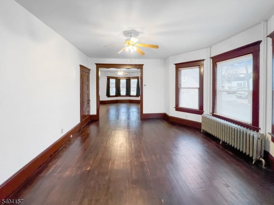 Welcome to this beautiful two family home situated on a desirable corner lot, offering timeless character and exceptional versatility. Rich with original trim and stunning woodwork throughout, this property showcases craftsmanship you simply can?t find in newer construction.The first floor unit features a comfortable 1 bedroom, 1 bathroom layout which perfect for owner-occupancy or rental income. The expansive second-floor unit offers 5 spacious bedrooms and 1 full bathroom, providing ample space for a large household or strong rental potential.Adding even more value is a three-car detached garage, ideal for additional rental income, storage, or off-street parking?an increasingly rare find. Whether you?re an investor looking to maximize cash flow or a homeowner seeking a property with built-in income, this unique two-family delivers charm, space, and opportunity all in one.