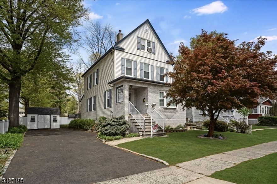 Charming 3 Bedroom Home with Finished Attic, Sunroom and Garden Oasis   Next to School & Near NYC Transit More than just a home, this property offers space, flexibility, and a backyard built for everyday living. Featuring 3 bedrooms, 1.5 baths, a finished attic, and multiple flex areas, the layout adapts to a variety of needs. The main level includes a bright living room, dining area, kitchen, and a sun-filled front room with bay window perfect as a sitting area, office, or workout space. Upstairs offers three bedrooms and a full bath with a recently updated tub, while the finished attic provides bonus space for a playroom, office, or additional storage. The true highlight is the fully fenced backyard, designed for outdoor enjoyment with fruit trees, gardening areas, a large deck, patio, and a natural gas grill included. Two sheds add extra storage, making the space both functional and inviting. Additional features include central heat and A/C, an unfinished basement with laundry and extra refrigerator, and all major appliances included. Located directly next to a school and just minutes to the train for NYC access, this home combines suburban comfort with commuter convenience. A unique opportunity offering lifestyle, flexibility, and location all in one.