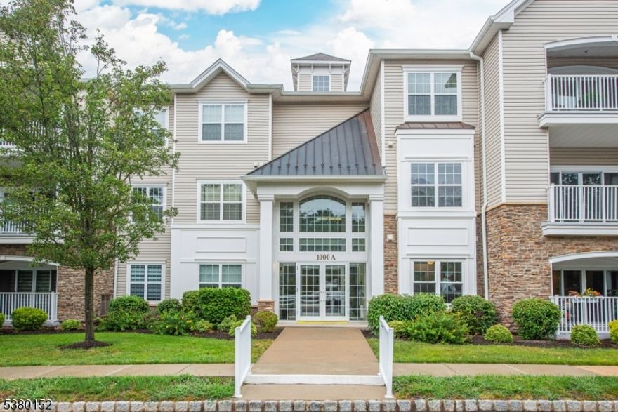 Extraordinary price for END UNIT!!  JUST PAINTED: LR, DR, Den,Hallway, Kitchen & Guest Bath. View of woods from this EMERALD Model END UNIT w//130 S.F. more space plus 2 garage spaces & add'l windows.  Dramatic entry w/tray ceiling opens to the formal dining room w/columns & chair rail The Living Room's sliding glass door steps out to a covered balcony w/closet facing green views on a quiet cul-de-sac street.  The kitchen hosts a table for six, SS refrigerator & DW, custom backsplash, under-counter lighting & lge pantry. The Library/Den boasts custom built-in desk/entertainment center.  The Ensuite Primary Bedroom is punctuated by a tray ceiling, better carpet, ceiling fan & large windows. The Primary Bath offers a double vanity, over-sized shower stall w/seat, California style walk-in closet, linen & "water" closets. The laundry room has cabinets, shelving & a sink. There's a Guest Bedroom & Guest Bath w/custom mirror.Lots of upgrades! Lots of storage including a separate, dedicated closet down the hall.Security alarm hardware installed.  SOMERSET RUN is an active & inclusive Over 55 community offering a 25,000 S.F. clubehouse w/ indoor & outdoor pools, hot tub, billliards, exercise, art, card, game & ball rooms.. Lots of clubs, events & activities. Minutes to major highways, NJ Transit & Suburban Bus Line to NYC, excellent healthcare, theater, fine restaurants & Big Box stores.  JOIN US! Garage Spaces: 1 & 15, Storage Rm # 2.