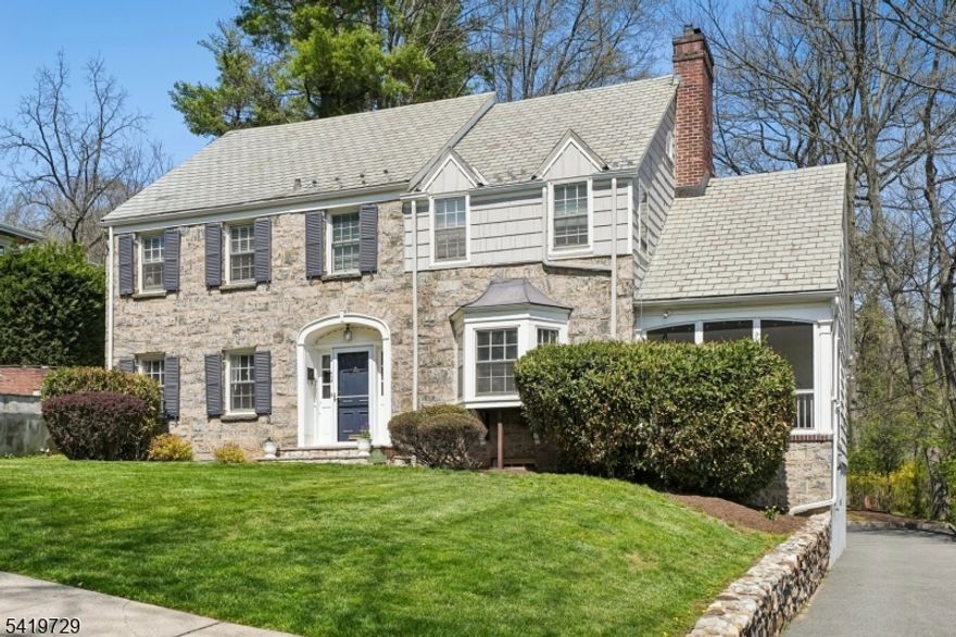 5-BEDROOM CENTER HALL COLONIAL. PRIME SOUTH ORANGE LOCATION, WALK TO TOWN, SCHOOL, TRAIN * Welcome to 459 Overhill Road, a spacious Colonial designed for modern day living! A gracious foyer leads to LR w/ bay window & wood burning FP. Off the LR is a private home office & sunny screened porch w/ views. An elegant formal DR flanks the foyer on the left. Toward the rear is the heart of the home, the open kitchen/family room. The kitchen features a center island, professional grade stainless steel appliances, warm wood cabinetry, granite counters, sunny breakfast nook & tons of storage. The family room is an absolute showstopper with vaulted ceiling, soaring stone fireplace & french doors to the patio and yard. Powder room & laundry round out the 1st floor. Upstairs are 5 BRs & 3 full BTHs. The primary suite features a sitting area, custom walk-in closet & spa-like bath w/ marble vanity & glass shower. The other 3 BRs on the 2nd floor share a large renovated hall bath. The 5th BR w/ its own full BTH is located on the 3rd floor, affording privacy for guests or an au-pair. The lower level features a rec room, storage & utility rooms, & attached 2-car garage. Outside be wowed by the paver patio & large, flat yard w/ open lawns & beautiful plantings. 459 Overhill is located in the prestigious Upper Wyoming neighborhood, just a stone's throw from downtown South Orange, South Mountain Reservation & the train for a quick ride to NYC. Welcome home!