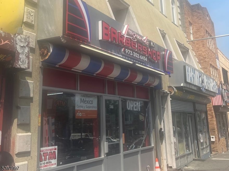 PRICE IMPROVEMENT!   Huge upside potential  on this mixed use with 2 commercial and 4 residential units       Next door property 473 Clinton also on the market for $899,998    MLS 3948573   Owner will consider  Discount if both buildings purchased together