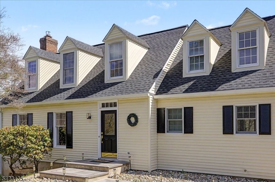 Set on over two private acres in White Township, this classic Cape Cod offers a peaceful, country setting just minutes from historic Belvidere. Inside, a warm and inviting layout centers around a spacious kitchen with island seating and gathering spaces anchored by a wood-burning stove.Outdoor living is equally compelling, with a large newer deck and pergola overlooking expansive grounds ideal for recreation or quiet enjoyment. Multiple garage bays and an outbuilding provide exceptional flexibility for car enthusiasts, hobbyists, or additional storage.With four bedrooms and an unfinished basement offering room to expand, 442 Buckhorn Drive presents a rare opportunity to create a refined lifestyle defined by space, privacy, and potential.