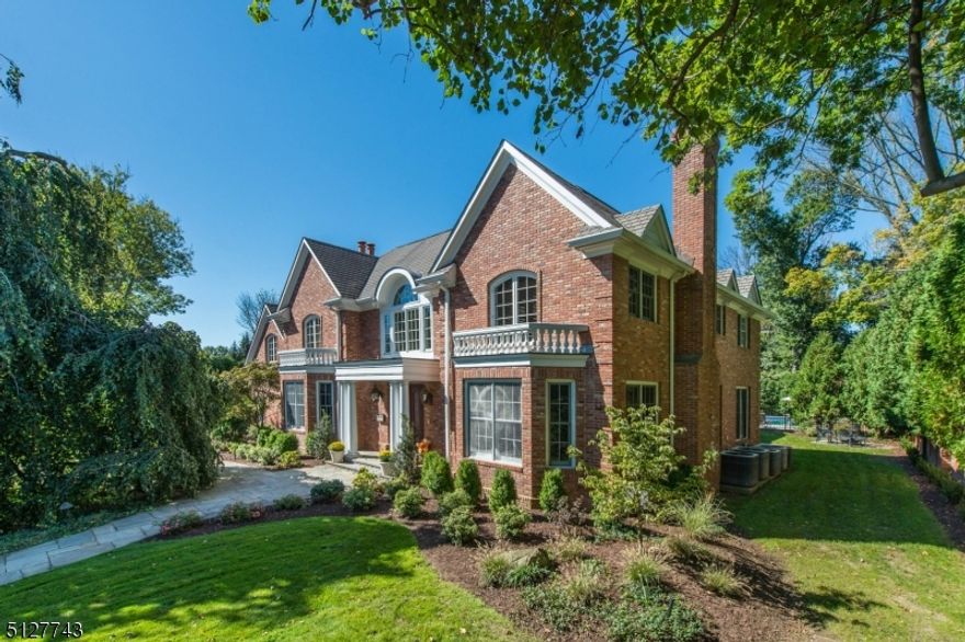 A solidly built all brick custom colonial in the Fairfield Section of Short Hills. This exquisite 5BD/6.5BA home combines refined grandeur, contemporary convenience &outstanding outdoor space. The extraordinary residence accommodates lavish entertaining & relaxed daily life surrounded by 10-foot-tall ceilings, inlaid marble ,hardwood floors, custom wall & window treatments, and elegant millwork. The spectacular foyer is flanked by a grand double staircase, a formal dining room with coffered ceilings and a fireplace, and a formal living with an attached library. The family room is a magnificent gathering place thanks to its fireplace, vaulted ceilings and arched windows. The sprawling work-of-art kitchen offers updated cabinetry and countertops, a climate-controlled storage pantry, a separate butler's pantry and upscale appliances by Thermador, Sub-Zero, Miele and more. A breakfast room, full bath, laundry room and powder room complete the main level. Above, the palatial Owner's suite has a cupola-topped sitting area, two en-suite spa bathrooms and custom closets. Four more bedrooms, two baths and a second laundry room provide luxurious accommodation Enjoy a huge lower level with a game room, recreation/media room, home gym, kitchen and bath. Outside, the 0.65-acre grounds feature a heated pool, spa, fountains surrounded by patios, a fire pit, rolling lawns and gardens. Four-car garage, zoned HVAC, Generac generator. Superb location close to Short Hills and Milburn amenities.