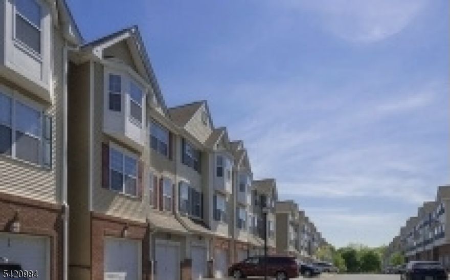 3rd floor unit, hardwood floor in living area. 2 beds, 2 baths