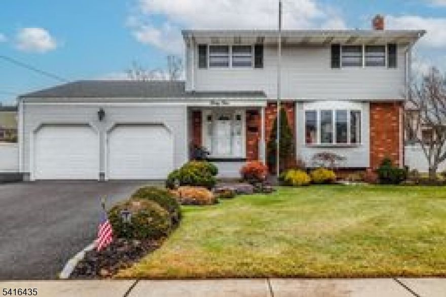 Prime Location! Amazing four bedroom 2 1/2 bath colonial on quiet street in desirable Claremont Section with EZ access to NY train*airport*main roads*schools*parks*shops*Country Club*restaurants*meticulously maintained inside and out*Comfortable, elegant living on quiet street*Features Foyer*Formal Lr & Dr*Fam rm w/woodburning stove*king-sized primary br w/bath*H/W floors*full base*2 car gar*C/A*gas heat*patio in yd*lots of natural light through bay and bow windows*Enchantment for sale* Must See