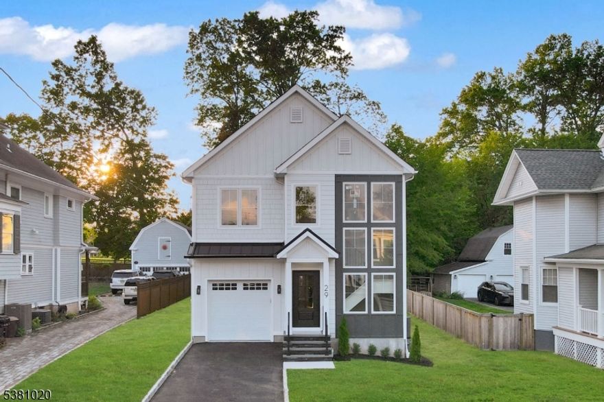 Experience the Best of Chatham Living in this Stunning New Construction Colonial! Perfectly situated just blocks from the Park, Train Station, vibrant downtown & Top ranked schools, this 5-bed, 4.5-bath luxury home offers modern living across 3 meticulously crafted levels on a level lot with a spacious backyard. Step into the elegant 2 story staircase chamber and be greeted by sun-filled formal living & dining rooms with designer finishes, as well as a private home office with French doors. The heart of the home is a chef-inspired gourmet kitchen feat. a large center island, High-End stainless steel appliances, and an open-concept layout that flows seamlessly into the inviting family room with a cozy fireplace. Glass sliders lead to a generous patio, creating a perfect setting for indoor-outdoor entertaining. A well-appointed mudroom, stylish powder room, & direct garage access complete the main level. Upstairs, unwind in the luxurious primary suite boasting 2 closets incld. a walk-in closet, and a spa-worthy bath with soaking tub, dual stall showers, and double vanity; Two bedrooms share a Jack-&-Jill bath; a 4th bedroom and a separate hallway bath. A central laundry room with shelves and sink add to everyday ease. The finished lower level offers a spacious recreation area, a 5th bedroom, a full bath & plenty of storage space. Enjoy peace of mind with a 10-Year Builder Warranty. This is your chance to own a brand-new home in one of Chatham Boro's most sought-after locations.