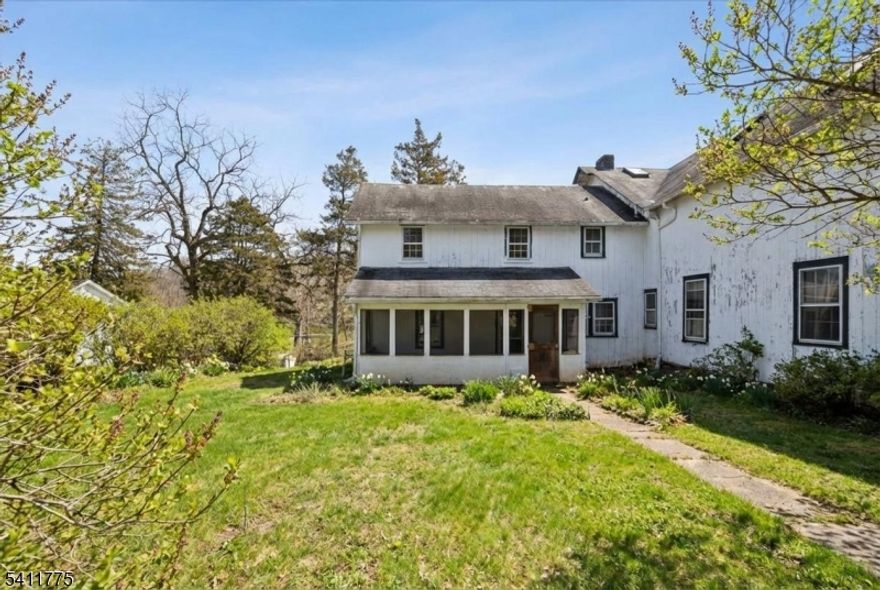 Enjoy the best of country living on a vintage farm estate with classic vintage features include plentiful natural light, wood floors throughout, glass-front cupBOArds, and charming floor plan. Newly-repainted interior, newly-renovated bathroom, newly-refinished wood floors throughout, new range, microwave hood, washer, and dryer. Heat (and sewer, water, and garbage/recycling) included in monthly rent for ease of budgeting. Large screened porch overlooking secluded backyard extend the enjoyment of the estate setting. Exceptional location blends lifestyle and commuting advantages with location near shopping, dining, hiking and other recreation areas (Natirar, Shiff Nature Preserve, Jockey Hollow), and NJ Transit commuting trains/buses/highways (1.3 miles from Far Hills train station). Lease offer on landlord's lease form, lease application, and income and employment verification required to apply. Pets are considered on a case by case basis for an additional monthly fee.