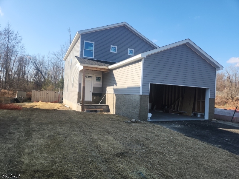 SPARTA - NEW HOME!  Can accomodate an end of JANUARY CLOSING!!!    GREAT CUL-DE-SAC LOCATION!  SHEFFIELD MODEL W/TWO CAR GARAGE!  NATURAL GAS, TOWN WATER & SEWER!  CLOSE TO TOWN & MAJOR ROADWAYS!  GREAT FLOOR PLAN, 4 BR'S, 2.5 BATHS, WOOD FLOORING ON MAIN LEVEL & HALLWAY UPSTAIRS!  LIVING ROOM W/GAS FIREPLACE, FORMAL DINING ROOM WITH COFFERED CEILING,  EQUIPPED KITCHEN AMPLE CABINETRY, CENTER ISLAND, GRANITE COUNTERS, STAINLESS STEEL APPLIANCES -  DISHWASHER, MICROWAVE, GAS STOVE.  MASTER BEDROOM SUITE, WALK-IN CLOSET,  DOUBLE VANITY, STALL SHOWER, 3 ADDITIONAL BEDROOMS, MAIN FULL BATH, LAUNDRY ON 2ND FLOOR!  GAS HEATING, CENTRAL AIR, PAVED DRIVEWAY!  TURN KEY!  GREAT CURB APPEAL!  DON'T MISS THIS  OPPORTUNITY TO OWN A NEW HOME IN A GREAT LOCATION!  ENJOY ALL SPARTA TOWNSHIP HAS TO OFFER!    RARE OPPORTUNITY TO PURCHASE A "NEW HOME"!    Call for Details!