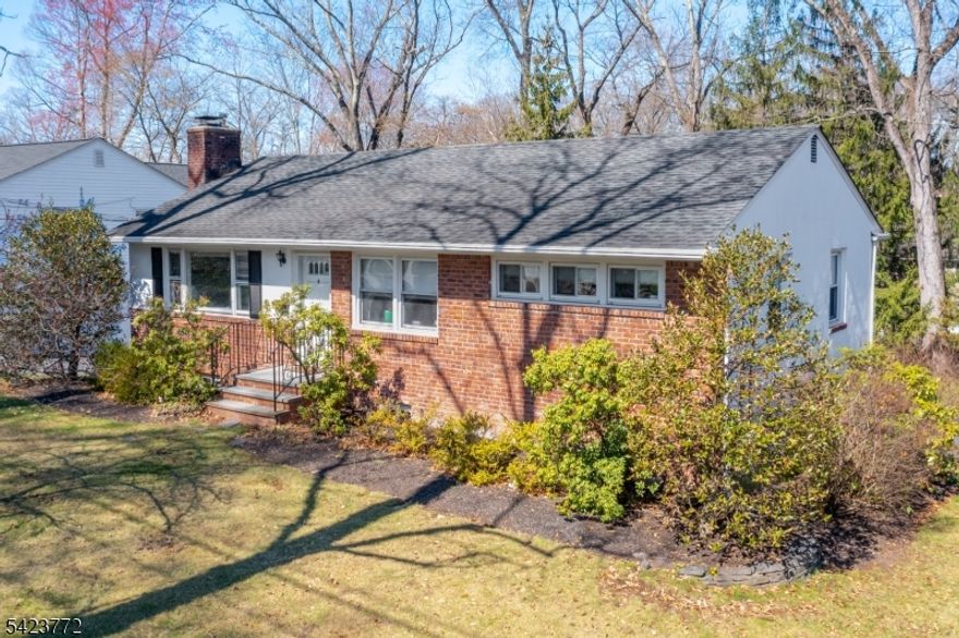 Welcome home to single floor living with raised ranch functionality. The first floor offers an open living room, dining area and kitchen, 3 bedrooms and a full hall bath. An abundance of sunlight offers a bright and relaxing atmosphere. The lower level of the home has a spacious family room, kitchenette with sink, countertop and cabinet storage, a laundry room, outside entrance to the yard/driveway and an attached oversized garage with inside entrance to the lower level. Explore the opportunity to convert basement powder room to a full bath to make a guest suite on lower level with egress (no representation being made).  Enjoy peace of mind with a whole house Generac generator! Outside, enjoy an open and spacious yard with a concrete patio in the back corner and mature trees lining the yard for privacy. Location is extremely convenient only 0.75m from the Chatham train station and downtown shops and restaurants, and 0.5m to Memorial Park, Chatham Community Pool and Chatham Library. Also 0.3m to Milton Ave. Elementary School. Driveway entrance on Harvard. Welcome home!