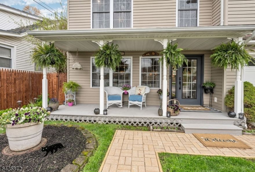 Welcome to this stunning, one-of-a kind, fully renovated 3BR Colonial offering picturesque year-round lake views directly across from Cozy Lake. Starting with the beautiful open front porch overlooking the lake, this home blends modern design with exceptional craftsmanship throughout, boasting beam ceilings, luxury vinyl plank floors, & an open, airy floor plan that feels straight out of an Instagram dream. The gorgeous kitchen is a true centerpiece, complete with butcher block counters, wood ceiling, new cabinetry, custom hood vent, instant-hot and a charming built-in breakfast nook with hidden storage, plus a beautifully detailed butler's pantry. Main level also offers a spacious living room, inviting family room with SGD walkout, full bath, and stylish first-floor laundry. Step outside to a private, fully fenced backyard that feels like an English garden, showcasing a patio with 2 gazebos, a workshop shed, & a second shed styled as a tiki bar, perfect for entertaining. Upstairs features 3 large bedrooms & a large office. Main bath offers a spa-like experience with cathedral ceiling, jetted tub & walk-in shower. Expansive primary suite offers lake views, walk-in closet, full bath & walk-up attic. A truly special home inside and out! With optional lake membership, enjoy access to beach, boating, & a warm, close-knit community. Newer windows, recessed lights, ceiling fans, generator hookup, new boiler. Come experience it for yourself. Close to 23/15 & shopping.