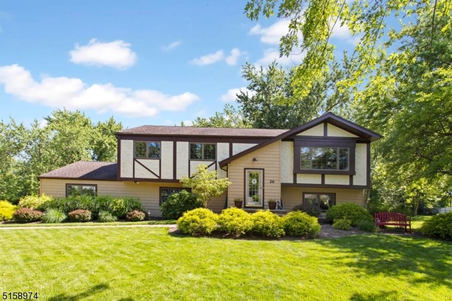 Peaceful, warm, and inviting home in the highly desirable Whippany section of Hanover Township. Generous sized LR & DR provides great spaces for gatherings. This 4 Bedroom, 2 1/2 bath Bi-level is an entertainer's dream. The home features an updated kitchen with SS appliances, granite countertops & breakfast bar that opens to the Dining Room. An expansive covered deck just off the kitchen/dining room adds to the entertainment factor of this home. MB with full bath & 2 additional bedrooms & updated bath.The ground level provides additional living space with a bedroom, oversized family room, recreation room, 1/2 bath & laundry room. The FR has a wood burning stove & sliders to a screened in patio. Recently refinished hardwood floors on the main level. A private backyard oasis awaits you with a Gunite pool, paver patio and level yard with wooded parkland to the back. Screened lower-level porch adds to the beauty of the yard. Oversized 2 car garage with plenty of room for cars and storage. Hanover Township is known for low taxes & excellent schools. Township has a beautiful town pool (additional fee), community center, before/after school programs, various sports programs and much more. Easy access to the Convent Station with NYC Midtown Direct Train. Short ride into downtown Morristown with restaurants, shops & theatre. Convenient to major highways.  Perfect house, perfect location & perfect condition. A tough combination to beat!  You will not want to miss this home!