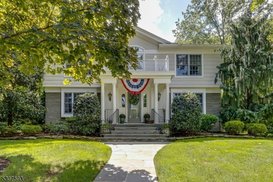 Nestled on a Private Lane, this elegant Custom Colonial Home blends timeless design with modern amenities.  The spacious first floor features a grand foyer, chef's kitchen with Viking, Sub Zero and Fisher & Pakel appliances, formal living room with marble fireplace, and an inviting family room with French Doors, wet bar, built in stunning bookcases and cabinetry, and breathtaking views of the manicured rear yard. Enjoy year round beauty in the sunroom surrounded by Marvin casement windows. Upstairs offers a serene primary suite plus three additional bedrooms, one currently transformed into an outstanding dressing room, which could easily be converted back into a bedroom.  The finished basement includes an office, wet bar, and Wave ventilation system. Outside, entertain on the blue stone patio with pergola and Lynx grill. Additional highlights include a whole-house generator, 4 zone cast iron baseboard  heating, central air, and a 2 car oversized garage.Both living room and family room fireplaces were woodburning converted to gas and are "as is" with no known deficiencies.