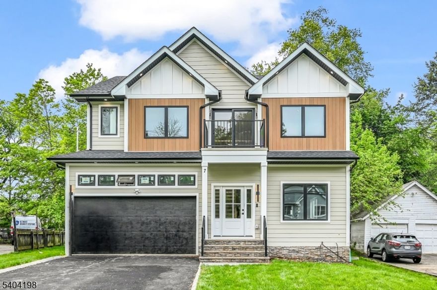 Welcome to this stunning NEW CONSTRUCTION Colonial home, located in a desirable Livingston neighborhood and the Mt Pleasant Elementary School district, within walking distance to the library, high school, and town center. Set on a leveled lot with a fenced backyard, this impressive 6-bedroom, 5-bath residence offers luxury living across three beautifully designed levels. A grand double-height foyer introduces the main level, featuring a formal living room, elegant dining room, guest bedroom, full bathroom, and mud room. The inviting open-concept layout showcases designer finishes throughout. The gourmet eat-in kitchen features custom cabinetry, a spacious center island, high-end appliances, quartz countertops, and a walk-in pantry. The family room flows from the kitchen and includes an elegant fireplace and sliding doors leading to the expansive flat backyard, ideal for entertaining. Upstairs are four generously sized bedrooms, including a luxurious primary suite with his-and-her walk-in closets and a spa-inspired bath with soaking tub, stall shower, and dual sinks. One bedroom is en-suite while two share a full bath. A convenient laundry room and BALCONY complete this level. The finished basement provides additional living space with an additional bedroom, large recreation room, and full bathroom. Modern smart home features and a 10-year builder's warranty ensure peace of mind.