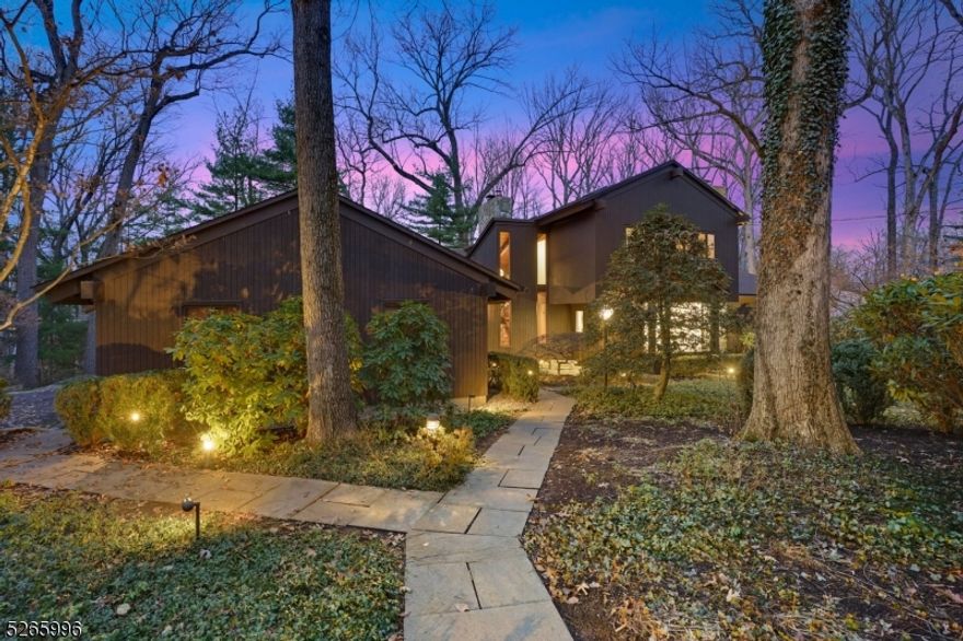 This custom built extremely spacious home is an extraordinary residence and is perfectly set on .92 private acres in the sought after Highlands neighborhood. Loaded with architectural interest, soaring ceilings, large windows, wood floors and amazing craftsmanship throughout this home truly is a masterpiece.  The open floor plan and stylish interior makes everyday living and entertaining special.  Walk in and enjoy the foyer that opens to a living room with cathedral ceiling and lovely stone gas fireplace with a door to deck, a banquet size dining room with sitting area enjoys a stone wall. The white eat in chef's kitchen features Wolf wall ovens and stove top, Subzero fridge, center island, wine fridge and breakfast room with a large window to enjoy the outdoors.  The kitchen opens to a very spacious family room with fireplace, built ins, wet bar and door to a second deck.  Two offices, a bedroom with full bath, a laundry room, 2 car garage and powder room complete this first level.  Continue to the second level and enjoy 3 bedrooms and two full baths and another finished space that easily could be a fourth bedroom.  The primary suite boasts a walk in closet and full bath.  This home enjoys a full basement with recreation room, work room and a large storage space.  The property is large, private and professionally landscaped, it's the perfect space to play, garden or relax. You're sure to feel like you're on vacation in this impressive home with amazing views in all seasons!