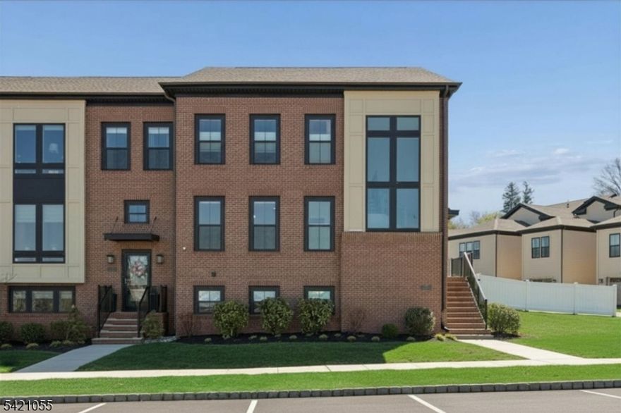 Expansive, upgraded 4 bed/3 full and 2 half bath end-unit townhome with 2-car garage (3,412 sf) in Montgomery Crossing just a few years young, one of the only newer construction homes available in Skillman, w/in the Blue Ribbon Montgomery Township School District. Set on a premium corner lot with expanded green space, fencing, and a sprinkler system, this home offers privacy and the feel of a single-family home with low-maintenance living. The open-concept main level is filled with natural light, featuring an entryway with walls of windows, a large quartz island, upgraded cabinetry, JennAir appliances and reverse osmosis system. A dining room and breakfast area open to a deck with stairs to the yard. The living room includes an upgraded electric fireplace with shiplap mantel and a powder room. LVP flooring runs throughout. Upstairs, the primary suite offers a tray ceiling, walk-in closet, and private bath. Custom closets enhance the primary, princess suite, and laundry. The princess suite includes its own bath, plus two additional bedrooms and a hall bath. Finished lower level with media room, exercise area, bonus room, bath, wet bar, and storage. Smart home features. Built in 2020 with 10-year structural warranty. HOA covers snow removal, trash, and common areas. Less than 0.25 mi to Montgomery Promenade (future Whole Foods), 0.4 mi to Starbucks, 0.5 mi to Montgomery Shopping Center, and 2.1 mi to Orchard Hill Elementary, with easy access to Route 206, I-295, and Princeton.