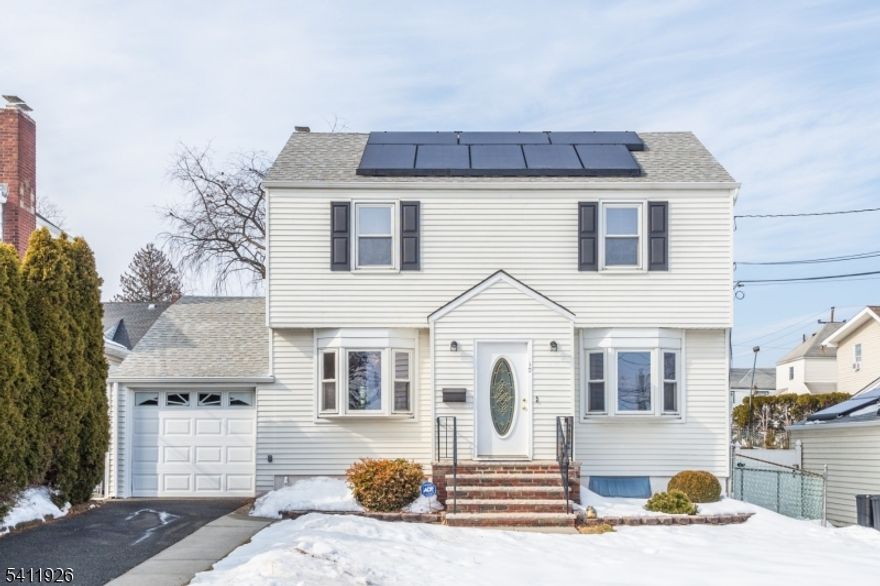 Expanded center hall colonial offering comfortable, move-in-ready living in a prime location. This beautifully maintained home features 3 bedrooms and 2 full, updated bathrooms, blending classic charm with modern convenience. The bright formal living room and full-size formal dining room provide the perfect setting for everyday living and special gatherings. An expanded eat-in kitchen offers generous space for cooking, dining, and entertaining. Additional highlights include an attached garage with direct access into the home, a full basement with a versatile recreation room for multiple uses, and central air conditioning for year-round comfort. Step outside to enjoy a private backyard with patio ideal for relaxing or outdoor entertaining. Conveniently located just steps to New York public transportation at the corner, and close to shopping, restaurants, and major highways. This immaculate home reflects true pride of ownership and is turn-key ready. A must-see opportunity you won't want to miss!