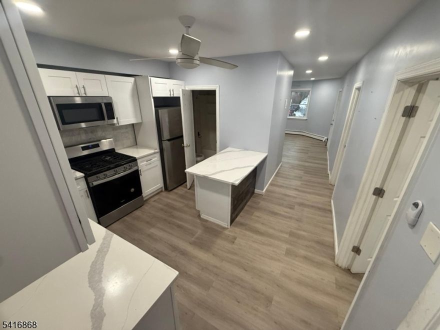 AVAILABLE IMMEDIATELY!!! This beautiful renovated apartment is ready for you to move in right away. The FIRST FLOOR UNIT features a modern kitchen and a clean, updated bathroom that make everyday living comfortable and easy.The apartment is located on a quiet dead-end street, giving you a peaceful place to relax after a long day. You can also enjoy the backyard, which is perfect for sitting outside, grilling, or spending time with friends and family.The location is very convenient, with easy access to main streets, transportation, and plenty of nearby shopping.There is plenty of street parking available.