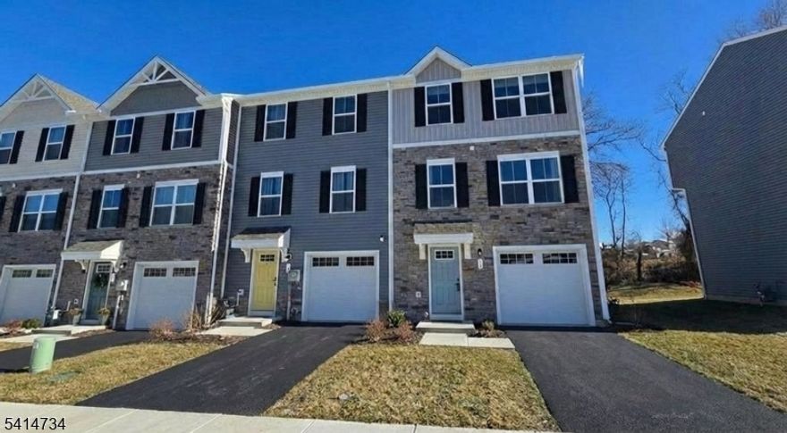 PRIME END-UNIT LOCATION! Welcome to this 2024 newly built Ryan Homes model end-unit townhouse, ideally situated in the highly sought-after Nature's Legacy section of Hawk Pointe Towns. This exceptional rental offers the best location in the community, featuring a private setting, additional side yard space, and a walk-out lower level a rare find. The inviting entry level includes a spacious foyer with direct garage access, a coat closet, and a versatile walk-out finished basement perfect for a home office, recreation room, or flex space. The main living level showcases a bright, open-concept floor plan highlighted by an upgraded kitchen with quartz countertops, center island, and stainless steel appliances, seamlessly flowing into the sun-filled living area. Luxury Vinyl Plank flooring enhances both the main and lower levels. The primary suite features a private en-suite bath with a walk-in shower and a custom, spacious walk-in closet. Enjoy outdoor living with a deck overlooking a scenic private backdrop ideal for relaxing or entertaining. Conveniently located near Route 31, with easy access to Route 22 and I-78, this home is a commuter's dream while still offering peace, privacy, and a premium lifestyle. Move-in ready and truly one of the best rentals available don't miss this opportunity!