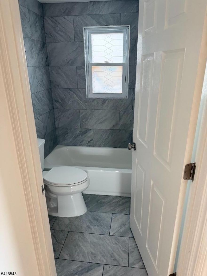 Freshly painted 2-bedroom, 1-bath apartment located in a well-maintained multifamily home in Plainfield. This bright and inviting unit offers comfortable living space with spacious bedrooms and an updated feel throughout. Enjoy access to a shared backyard, perfect for relaxing or outdoor enjoyment. Conveniently located near local shops, restaurants, parks, and public transportation. A great opportunity for tenants seeking comfort and convenience.