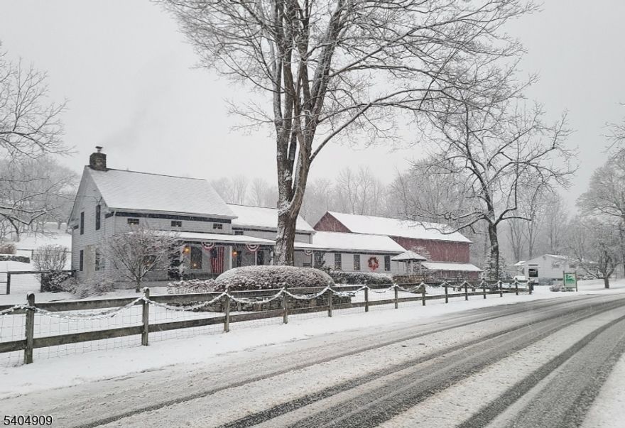 Welcome to Wantage, New Jersey's rural gem positioned 58 miles from NYC, featuring vast rolling hills of historic & bucolic farmland. Colonial Cider is a 50 acre Farmland Preserved homestead consisting of a beautifully restored farmhouse dating back to 1740 a large dairy barn that has been improved and renovated for commercial cider making. Perched above the buildings is the crown jewel of this property; an 18 acre SE exposure organic apple orchard featuring twenty 200 year old American variety apples. Access to the orchard is gained via the farm road on the low side of the property or the Skytop Rd entrance which features a breathtaking sense of arrival as you descend past an oak tree that has been standing tall for centuries. The grandiose view opens up to the postcard-like valley. Two building envelopes are presented atop the hillside. One acre assigned for winery/cidery operations and one acre area for a new residence to be constructed. Painstaking efforts went into soil making and organic farming practices for 30+ years to allow for prosperous and responsible growth and fruit production. In addition to the twenty apple varieties, many other fruit trees are found in the orchard, including an array of fourteen European pear varieties have been established for future pear cider production, an untapped market. Now is the time to fulfill the dream and continue the legacy of Colonial Cider!