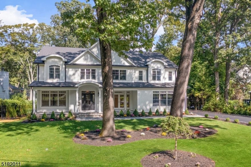 Westfield's own Wychwood is where you'll find this IMPRESSIVE, CUSTOM, BRAND NEW home by Elshiekh Custom Homes. This home boasts Exquisite Craftsmanship, Sophisticated Style & Designer Amenities. Some highlights include: Multi Room Media, High Tech Security Cameras, 20K Whole House Generator by Kohler, Central Vac, 4 Zone HVAC, Covered Blue Stone Porch for Entertaining, a Walk Out Basement with a wet bar, all on a HALF-ACRE Fenced in Private Property. The Charming Front Porch introduces an Interior that features a Welcoming Foyer, French doors in the Dining Room, Elegant Moldings, 9' Ceilings on the 1st floor, State-of-the-Art Kitchen along with a Spacious Family Room. The Master Bedroom Pampers you with a Sitting Room, 2 Sided Fireplace, Coffee Station, Walk-in Closets & Luxurious Bath. A Private 1st fl Bedroom with a Full Bath Welcomes Your Guests! Other Amenities Include 8,600 sf of Living Space & a Side Entry 3 car garage. There is Much to See in this MAGAZINE like STUNNING home!