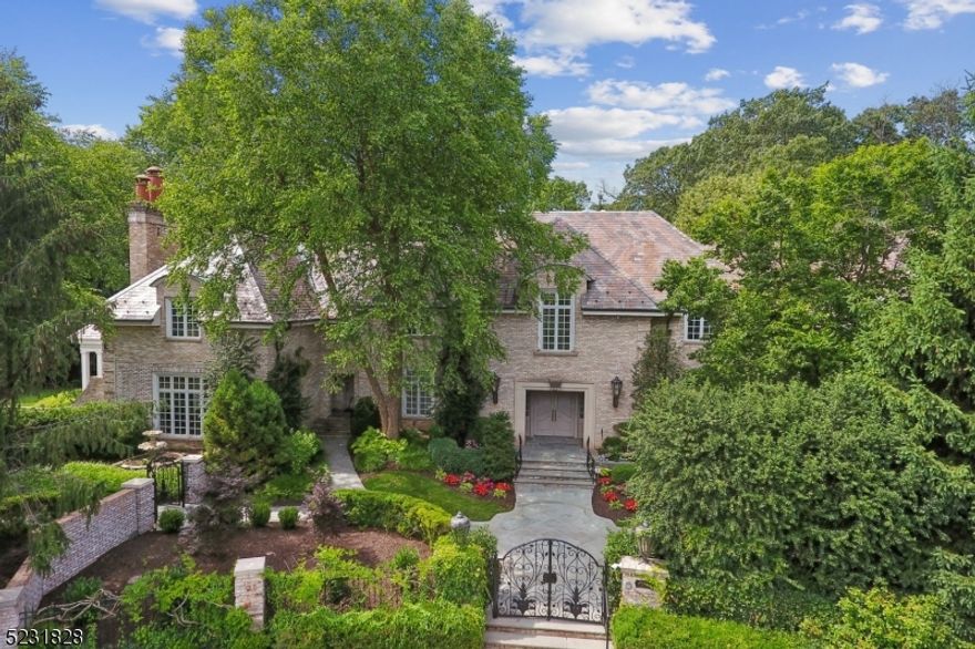 One owner Custom Built Colonial privately nestled at the very end of a sought-after Cul-De-Sac in an exceptional location backing up to the prestigious Baltusrol Golf Course. It offers luxury both indoors and outdoors, exquisite architectural designs, gated entry, fine craftsmanship, crown moldings, coffered ceilings, hardwood floors, and large windows overlooking the professionally landscaped property. The beautiful custom designer kitchen has high-grade appliances, custom cabinetry, expansive center island and elegant butler pantry. Formal dining room, family room, recreation room with a bar, office with a full bath, game room, movie theatre, exercise room, 3 car garage and much more! Six all En Suite bedrooms, 9 full and 2 half baths. The primary suite has its own wing with a bedroom, an office, a beautiful spa like bath, large walk-in closets, and a balcony overlooking the property. Welcome to the stunning "Resort Style" outdoor oasis with covered patios, outdoor kitchen, lush garden with a fountain, mature plants, flowers and a putting green. The house is complete with a beautiful inground pool, jacuzzi, a pool house with a large kitchen, a full bath and a wine cellar. This Luxury Property is conveniently located close to NYC transportation, shopping, schools and houses of worship. No detail is overlooked! A MUST SEE!