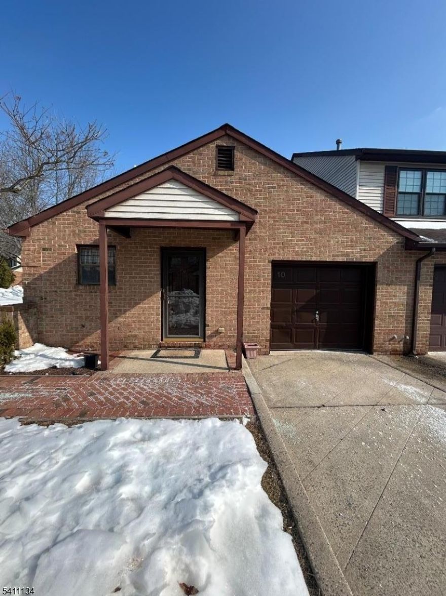 This stately brick end unit in the sought after Lebanon Commons Community offers the perfect combination of one-floor convenience and low-maintenance living. This unit features 2 bedrooms, 2 full bathrooms, and an open concept floorplan. This unit will need updating; and is being sold in "as-is" condition; perfect for owners who are looking to get their preferred style and also investors who could be looking for possible rental income (NOTE: confirm with HOA about rental opportunities). Practical features include an exclusive driveway, attached garage with storage, and public utilities. The association provides wonderful amenities such as a community pool, tennis courts, and sidewalks throughout the neighborhood. Conveniently located near local favorites such as the Lebanon Pub and Metropolitan Seafood, this home offers quick access to Routes 22 and 78 and is close to grocery stores, banks, pharmacies, shopping, and more.