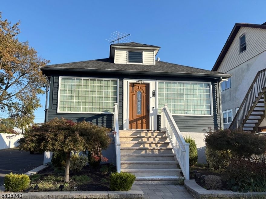 Welcome to 619 Hancock St in South Plainfield! Renovated in 2022. This cozy 2-bedroom, 2-bath home has a warm and inviting feel from the moment you step in. You'll love the bright living space, comfortable bedrooms, Spacious Eat in Kitchen with top-notch stainless steel appliances and tile floors , beautiful Engineered wood floors in the living room. Additional space in the attic to bring your ideas to life. Finished basement w/tile flooring, sprawling room with full bath & laundry. New Roof & Central A/C. Also offers an extensive driveway for up to 4 cars with a detached 1 car garage. The backyard is perfect for relaxing, barbecuing, or spending time with friends. Conveniently located near schools, parks, shopping, and major highways Rt 22, 287 and Garden State Parkway within minutes, this home makes daily living easy and enjoyable. Come see it for yourself it's move-in ready and waiting for you to make it yours!